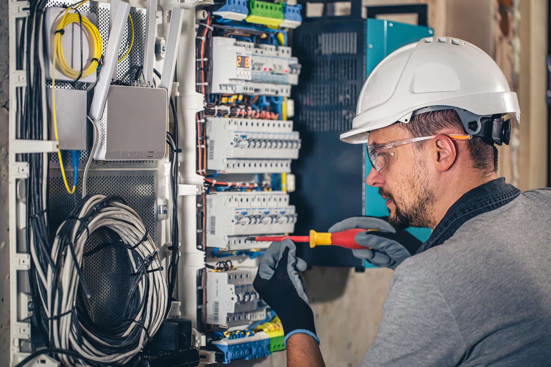 Electrician upgrading residential panels for B.Jags Electric in Bloomfield, CT, offering reliable electrical services.